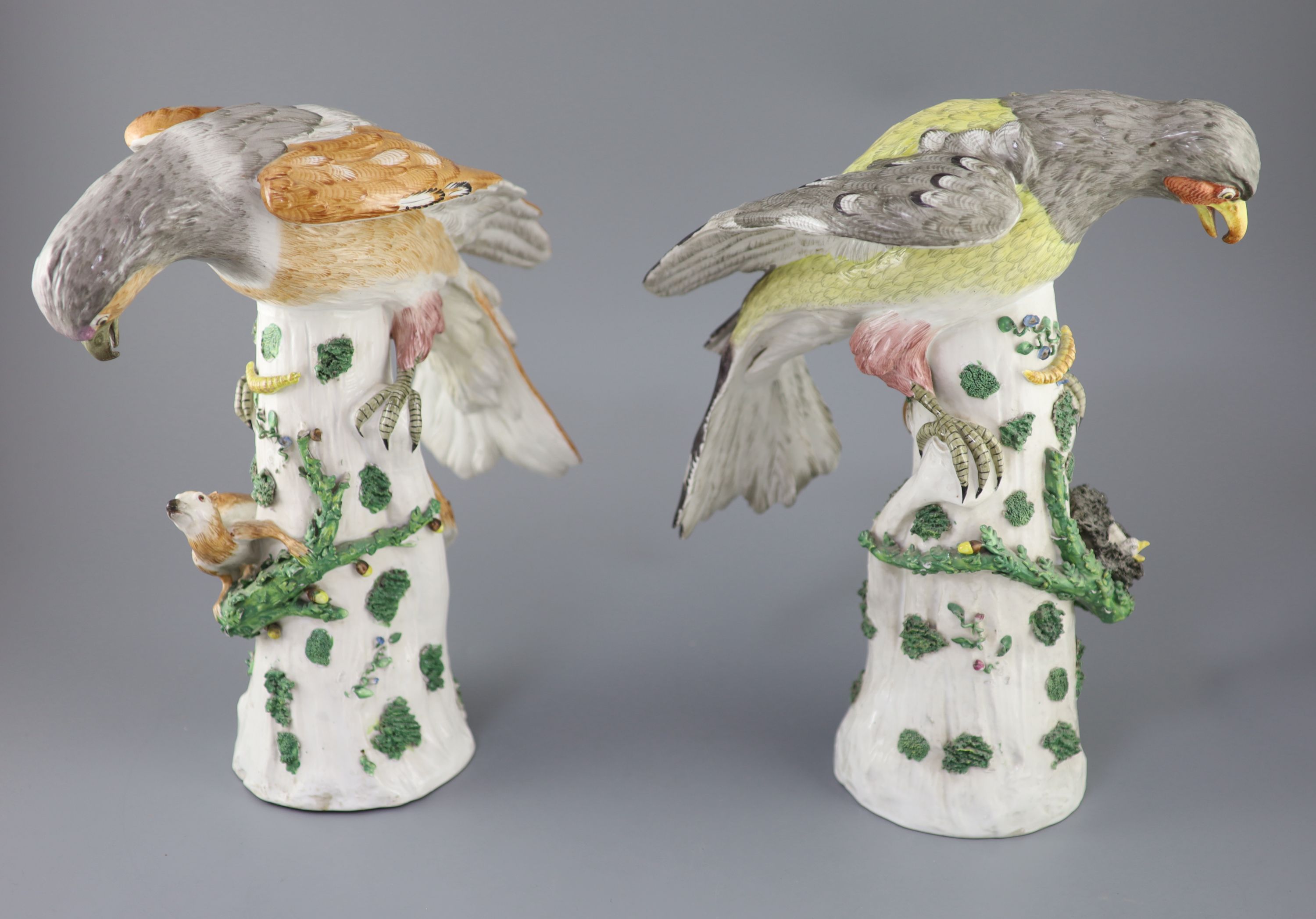 A pair of large German porcelain models of raptors, late 19th century, 37cm and 39cm